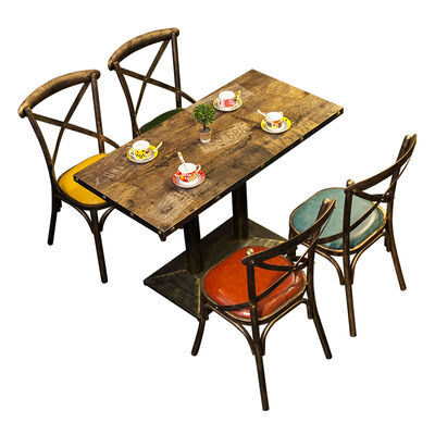 Buen precio American Industrial Vintage Style Restaurante Mesa de café Comida rápida de metal espalda cruzada sillas de comedor y juegos de mesa en línea