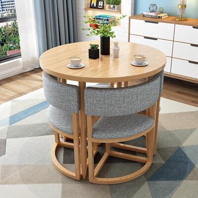 Prezzo buono Set di tavoli da pranzo rotondi in stile nordico, moderno tavolo da pranzo in legno massello e set di sedie per casa e appartamento in linea