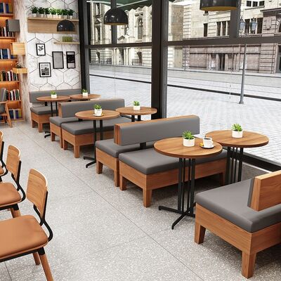 Prezzo buono Set di posti a sedere per ristoranti moderni con divano imbottito e tavoli rotondi in legno per mobili da caffè commerciali in linea