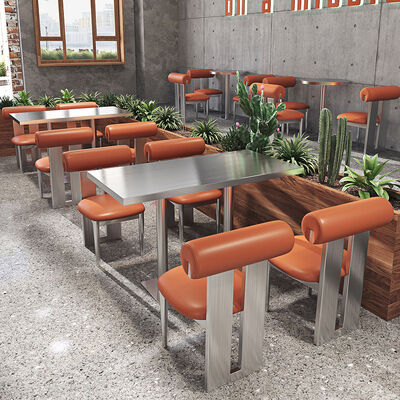 Bon prix Ensemble table et chaises de restaurant commercial moderne en acier inoxydable, chaises en cuir PU, meubles personnalisés pour bar et bistrot en ligne